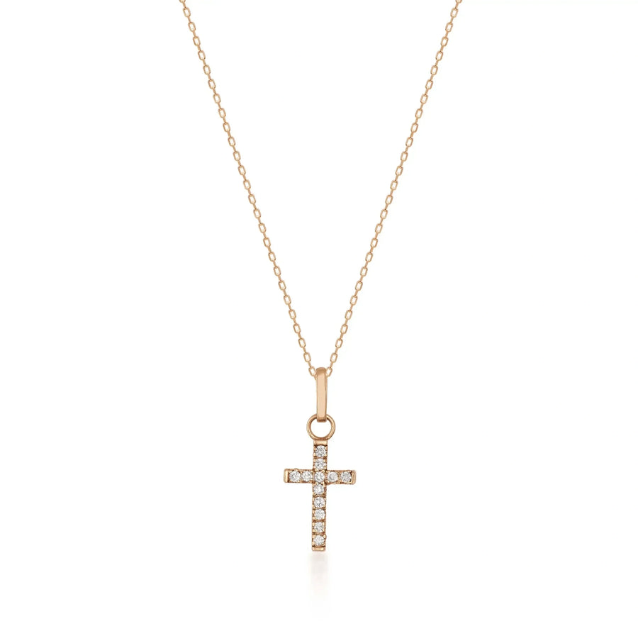 14K rose gold dainty CZ cross necklace on white background