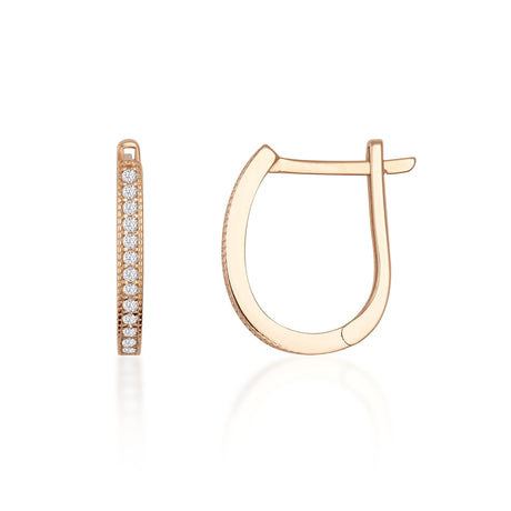 Créoles ovales pavées d'oxydes de zirconium en or rose 14 carats, vue de côté et de face sur fond blanc