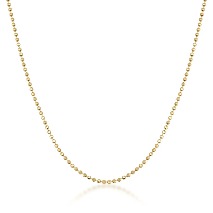 Collana a catena a pallini in oro giallo 14kt su sfondo bianco