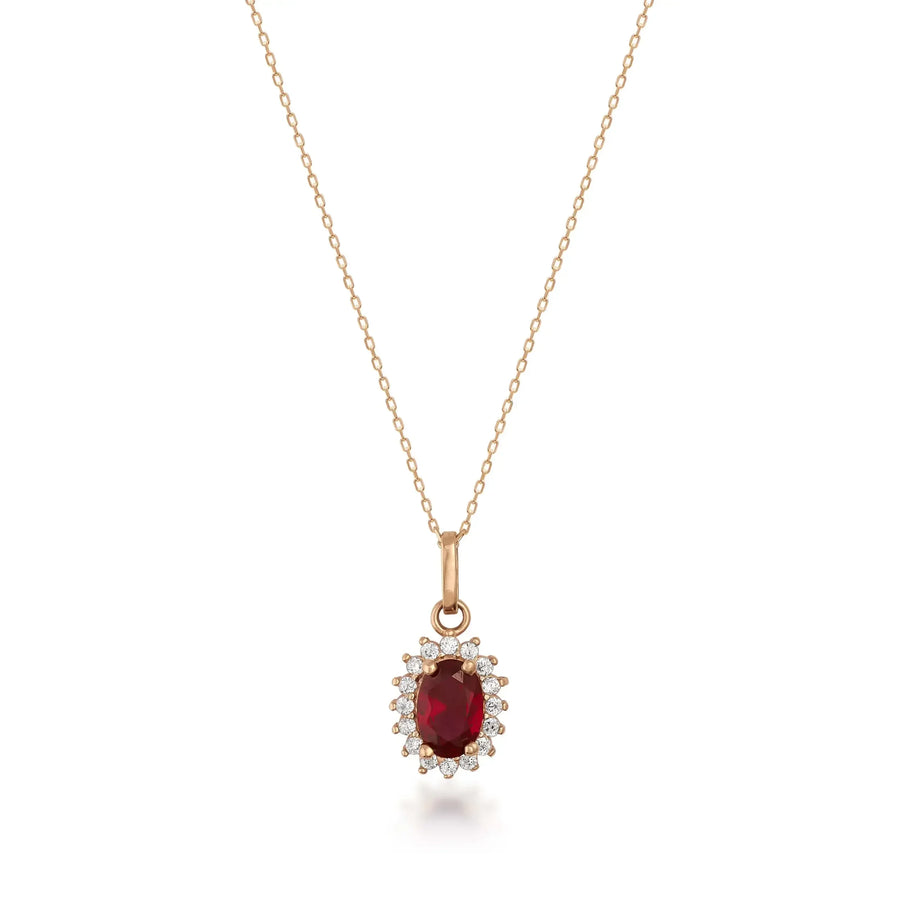 Collier pendentif halo rubis de synthèse en or rose 14 carats sur fond blanc