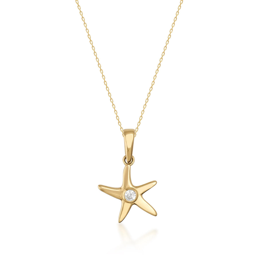 Collana con ciondolo stella marina in oro giallo 14kt con zircone centrale su sfondo bianco