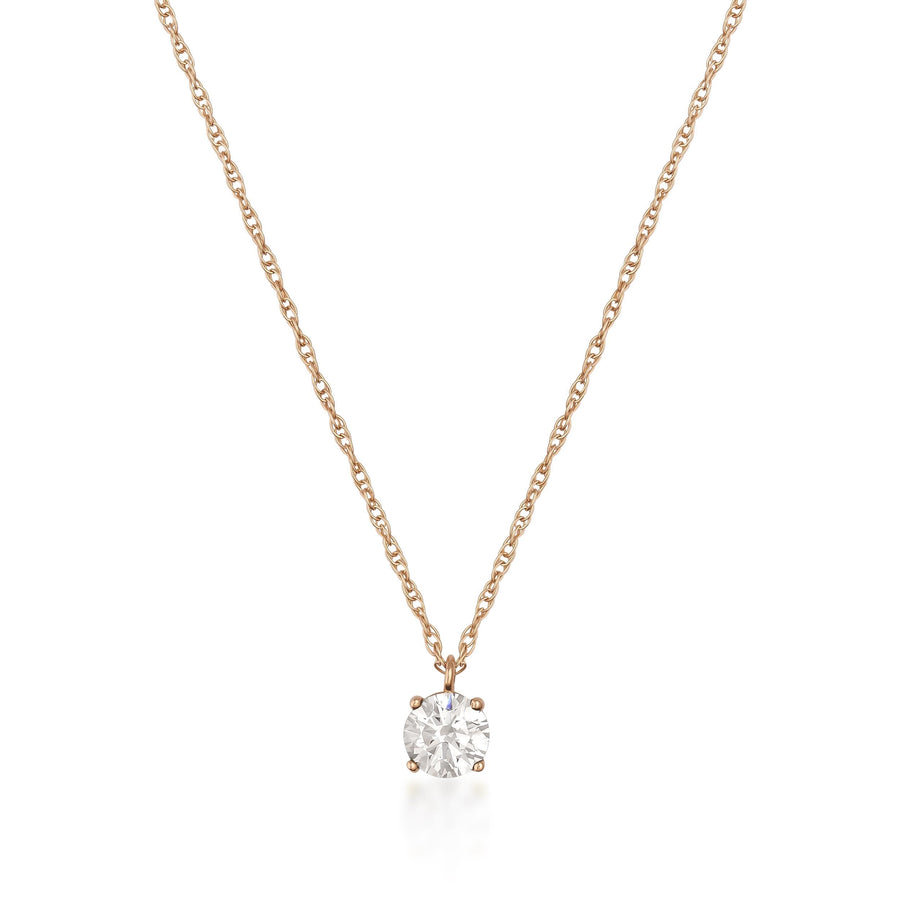 Collier solitaire topaze blanche en or rose 14 carats sur fond blanc