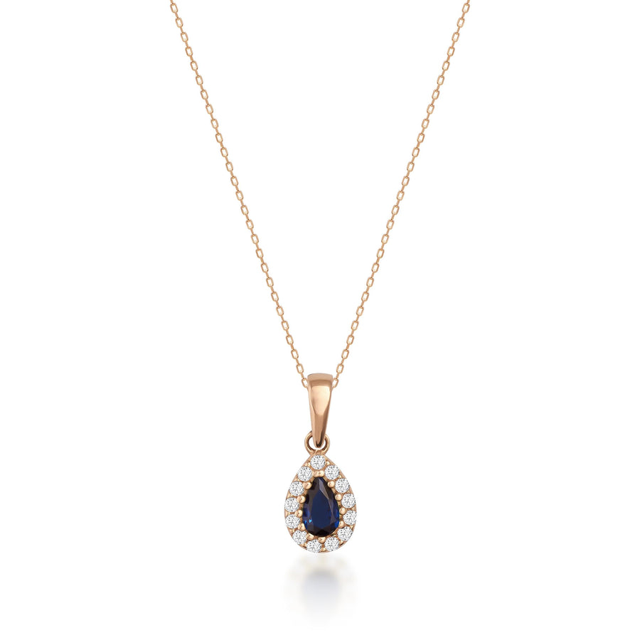 Collier pendentif halo saphir poire de synthèse en or rose 14 carats sur fond blanc