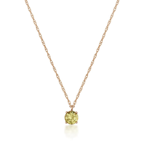 Collier solitaire citrine en or rose 14 carats sur fond blanc