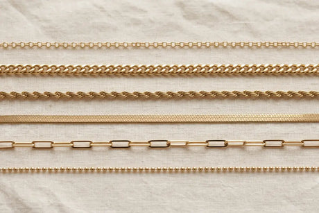 Six 14K gold chain link styles including cable, curb, rope, and herringbone