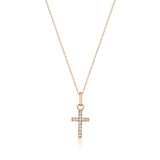 14K rose gold dainty CZ cross necklace on white background