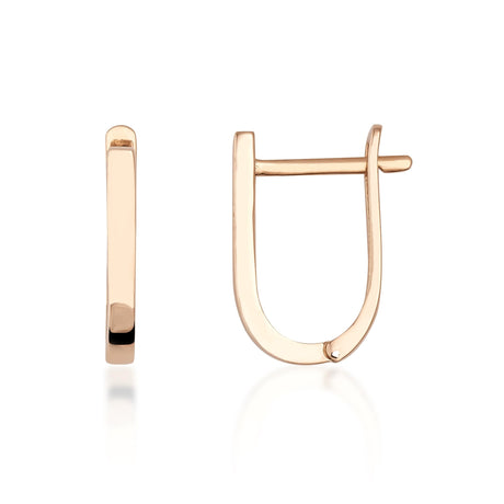 Créoles huggie ovales en U en or rose 14 carats, vue de côté et de face sur fond blanc
