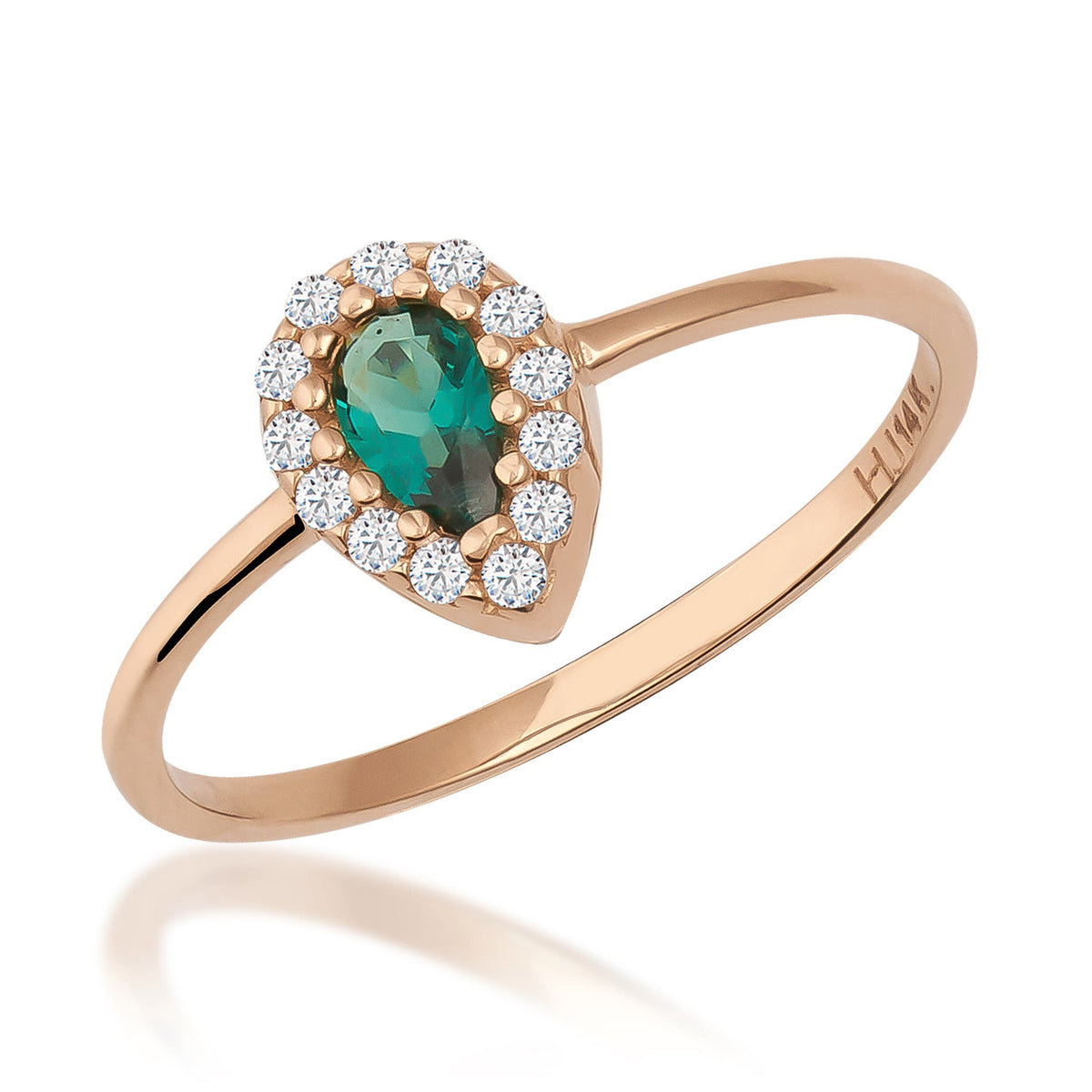 Pear halo ring in 14K rose gold with lab-grown emerald and CZ halo on white