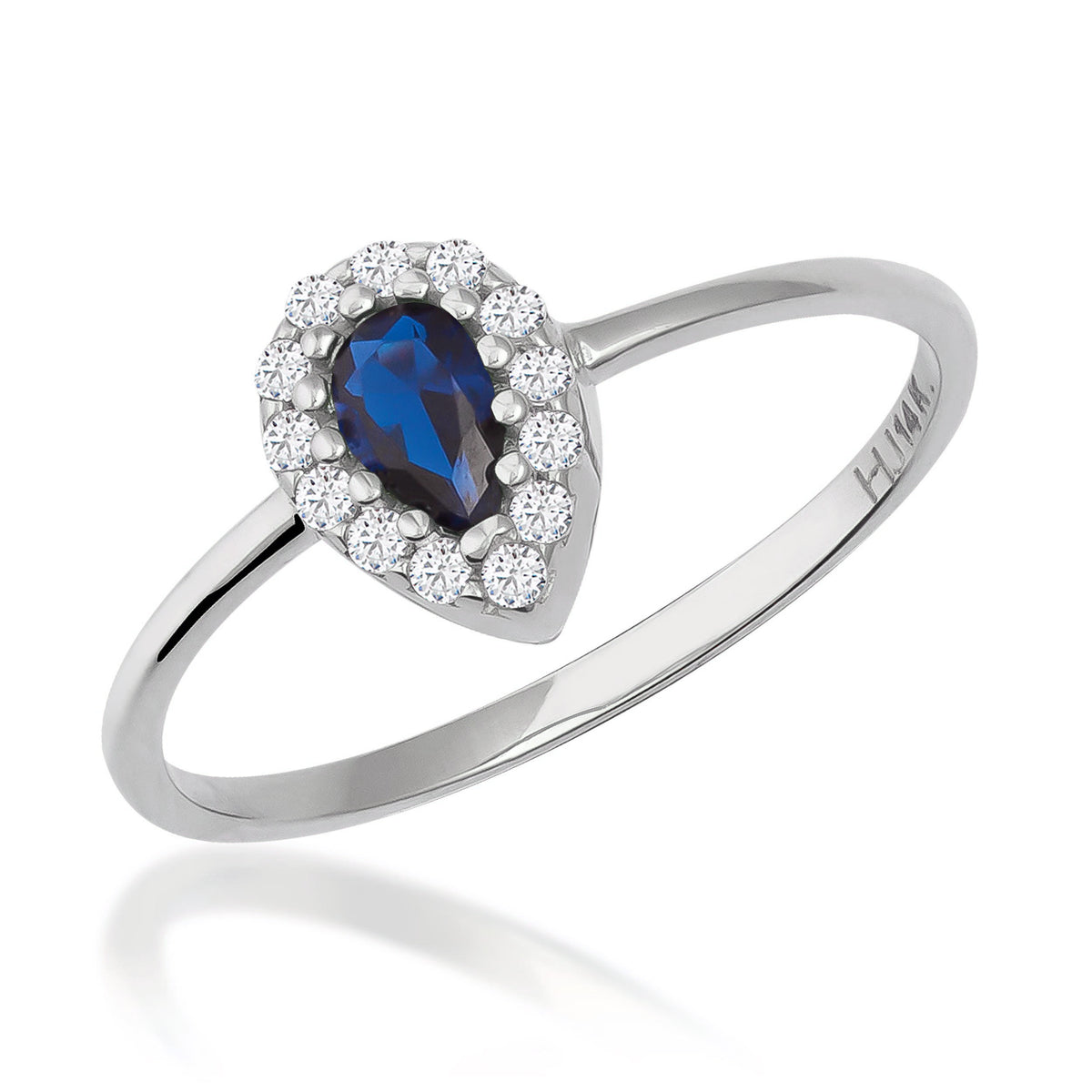 Pear halo ring in 14K white gold with lab-grown sapphire and CZ halo on white