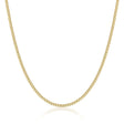 Chaîne gourmette plate en or jaune 14 carats sur fond blanc