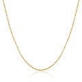 Chaîne maille boule en or jaune 14 carats sur fond blanc