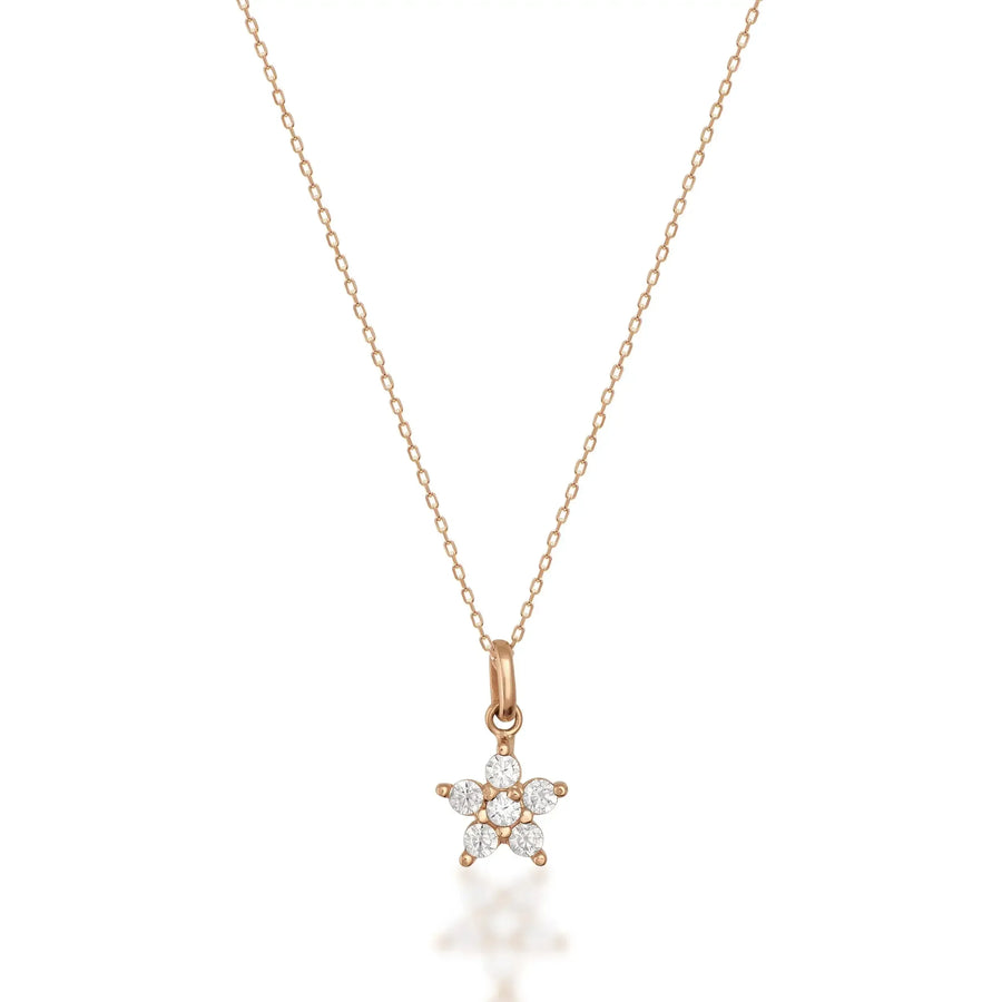 Collana con ciondolo fiore a stella con zirconi in oro rosa 14kt su sfondo bianco