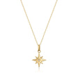 Collar con colgante de estrella polar con circonita central en oro amarillo de 14 quilates sobre fondo blanco
