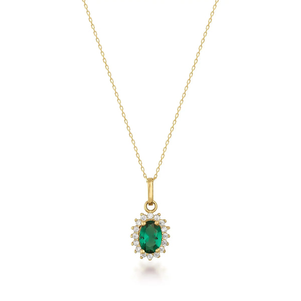 Collana con ciondolo halo in oro giallo 14kt con smeraldo creato in laboratorio su sfondo bianco