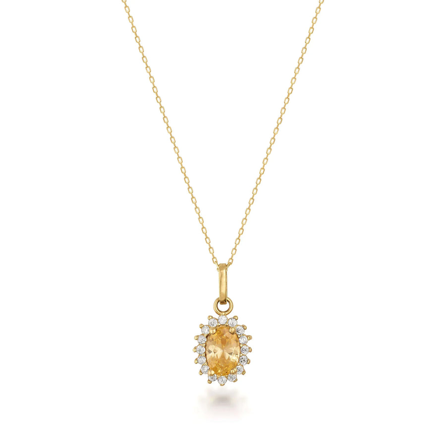 Collar con colgante halo de citrino de laboratorio en oro amarillo de 14 quilates sobre fondo blanco