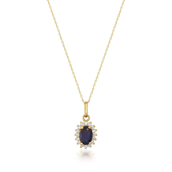 Collana con ciondolo halo in oro giallo 14kt con zaffiro creato in laboratorio su sfondo bianco