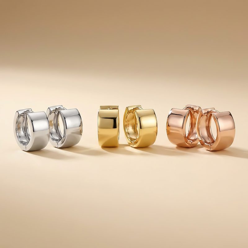 Créoles huggie en or blanc, jaune et rose