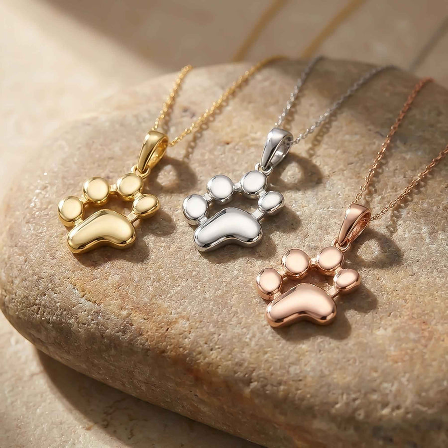 Colliers empreinte de patte en or jaune, blanc et rose 14 carats sur une pierre
