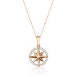 14K rose gold compass star necklace with CZ on white background