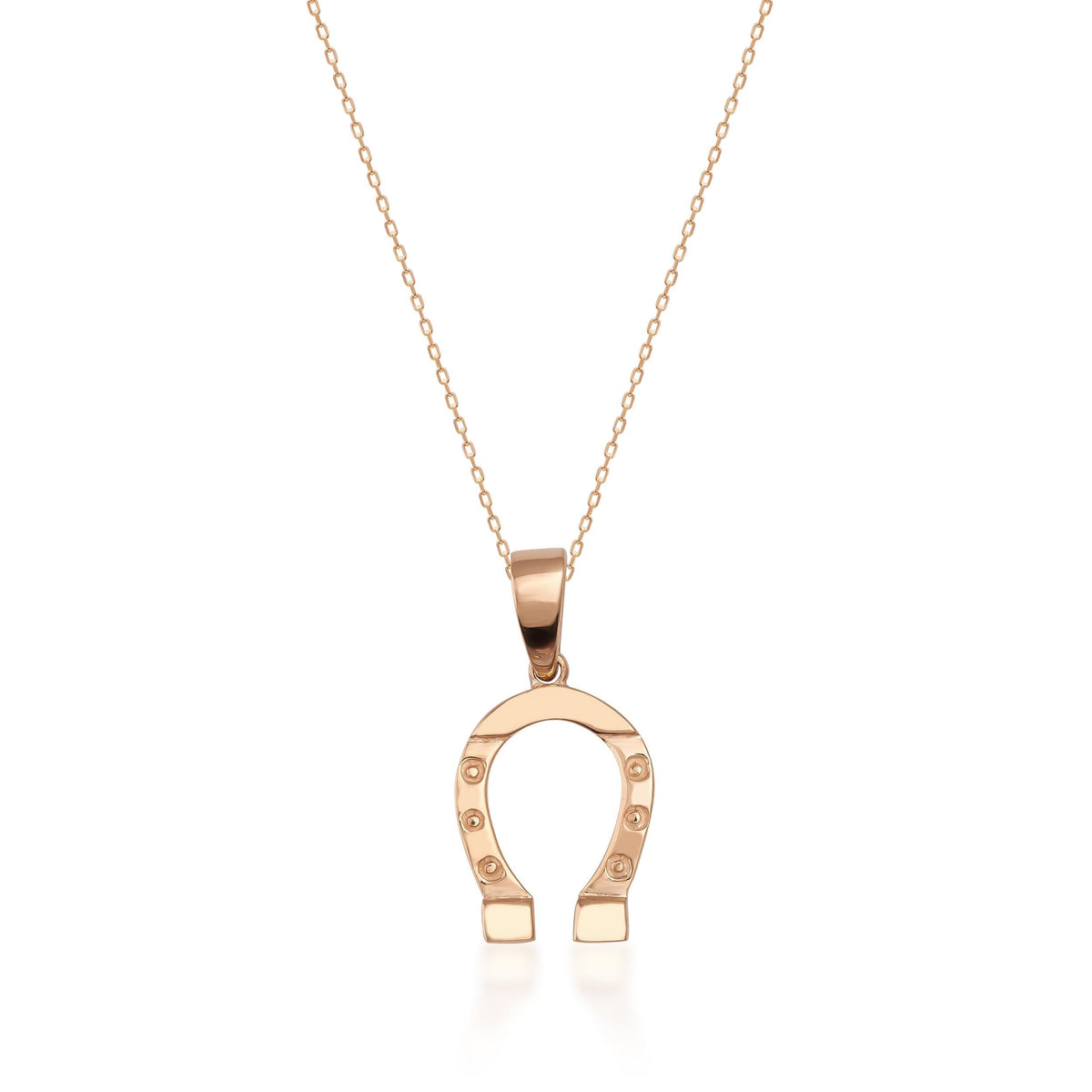Collier fer à cheval en or rose 14 carats sur fond blanc