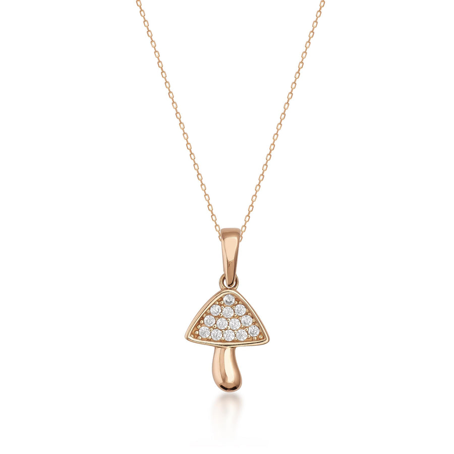 Collana con ciondolo fungo in oro rosa 14kt con cappello in zirconi su sfondo bianco