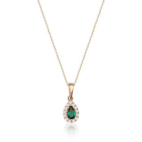 Collier halo émeraude poire de synthèse en or rose 14 carats sur fond blanc