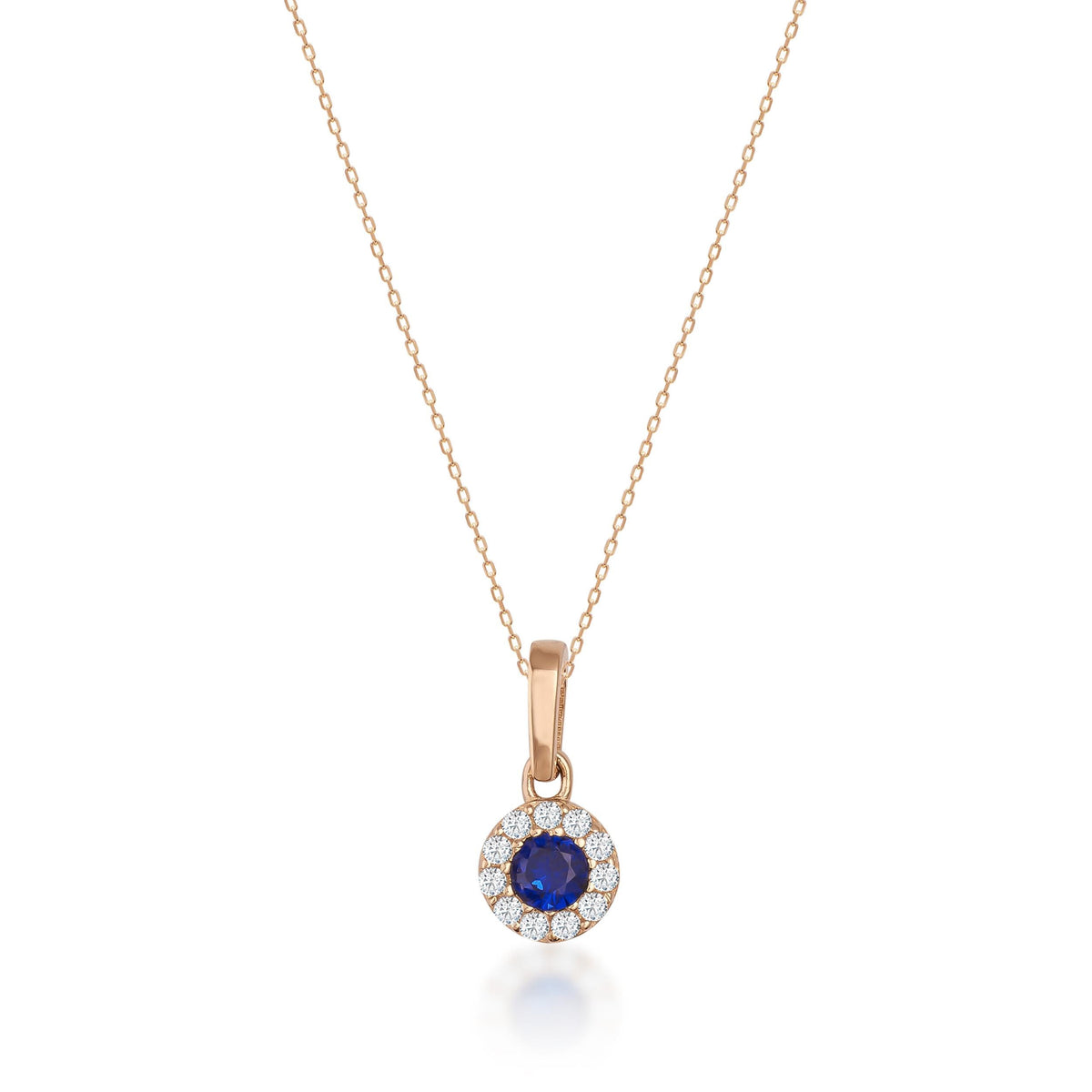 Collier halo saphir rond de synthèse en or rose 14 carats sur fond blanc