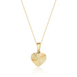 Diamond-cut heart pendant necklace in 14K yellow gold on white background