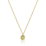 Collar solitario de citrino en oro amarillo de 14 quilates sobre fondo blanco