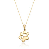 Collier empreinte de patte en or jaune 14 carats sur fond blanc