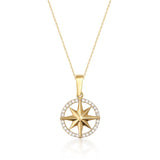 14K yellow gold compass star necklace with CZ on white background