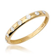 14K yellow gold CZ band ring on white background
