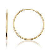 Orecchini a cerchio endless in oro giallo 14kt, vista laterale e frontale su sfondo bianco