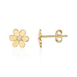 Puces d'oreilles fleur marguerite en or jaune 14 carats avec centre en oxyde de zirconium, vue de face et de côté sur fond blanc
