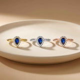Lab-grown sapphire pear halo rings in 14K yellow, white and rose gold