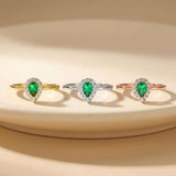 Lab-grown emerald pear halo rings in 14K yellow, white and rose gold