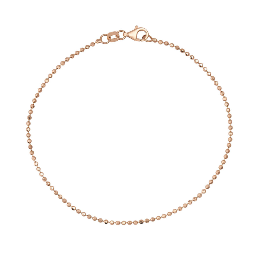 Pulsera de cadena de bolitas en oro rosa de 14 quilates sobre fondo blanco